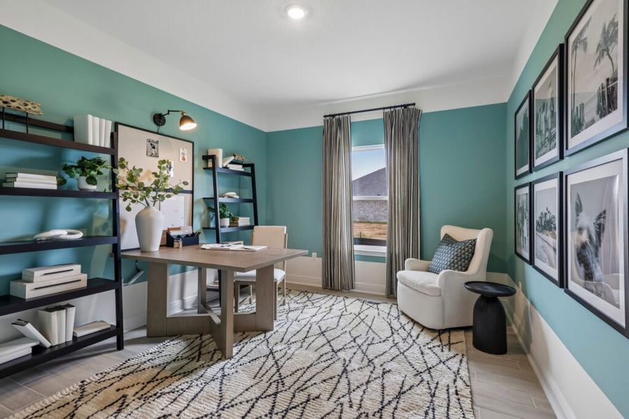 Furnished interior in a model home at Mahogany At Jubilee in Pace (Image 5).