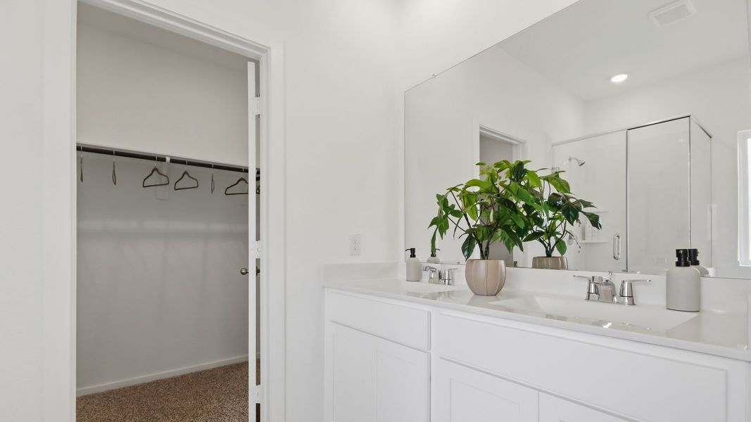 Furnished interior in a model home at East Williams Cove in Conroe (Image 18). Furnished interior in a model home at East Williams Cove in Conroe (Image 18).