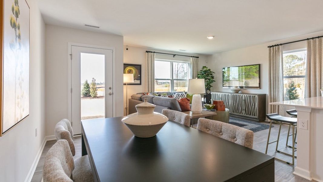 Furnished interior in a model home at The Townes at Matthews Landing in Fuquay Varina (Image 9).