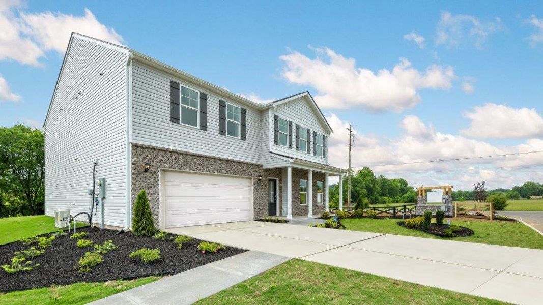 Front exterior of a home in the Lone Oaks Farm community, located in Cleveland, TN (Image 4). Front exterior of a home in the Lone Oaks Farm community, located in Cleveland, TN (Image 4).