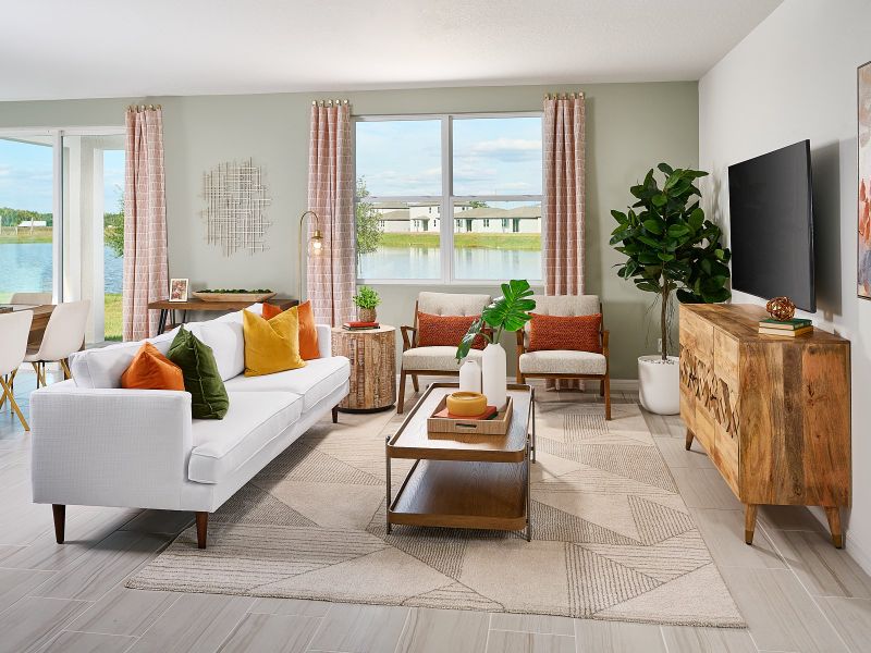 Family room in the Foxglove plan modeled at The Meadow at Crossprairie