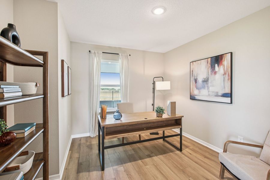 Furnished interior in a model home at Benton Hills in Brooksville (Image 9).