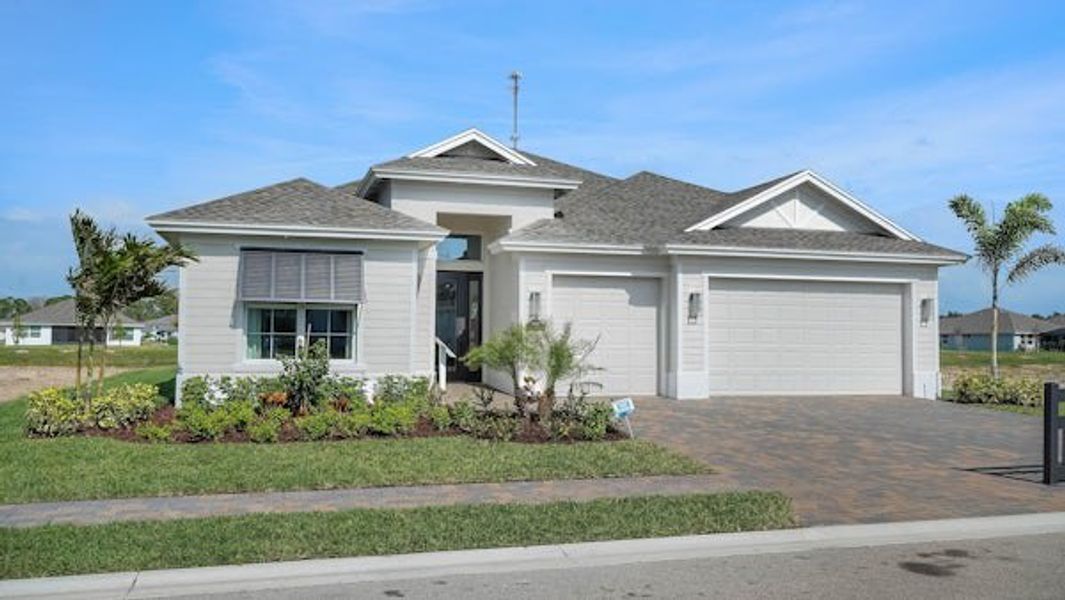 Front exterior of a home in the High Pointe community, located in Vero Beach, FL (Image 44).