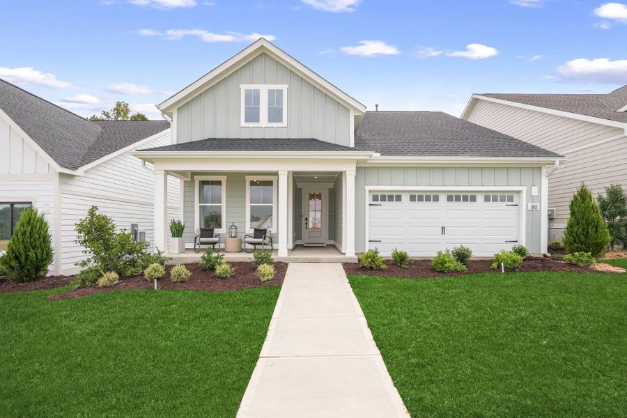 Front exterior of a home in the The Pines Collection at Serenity community, located in Fuquay Varina, NC (Image 1).