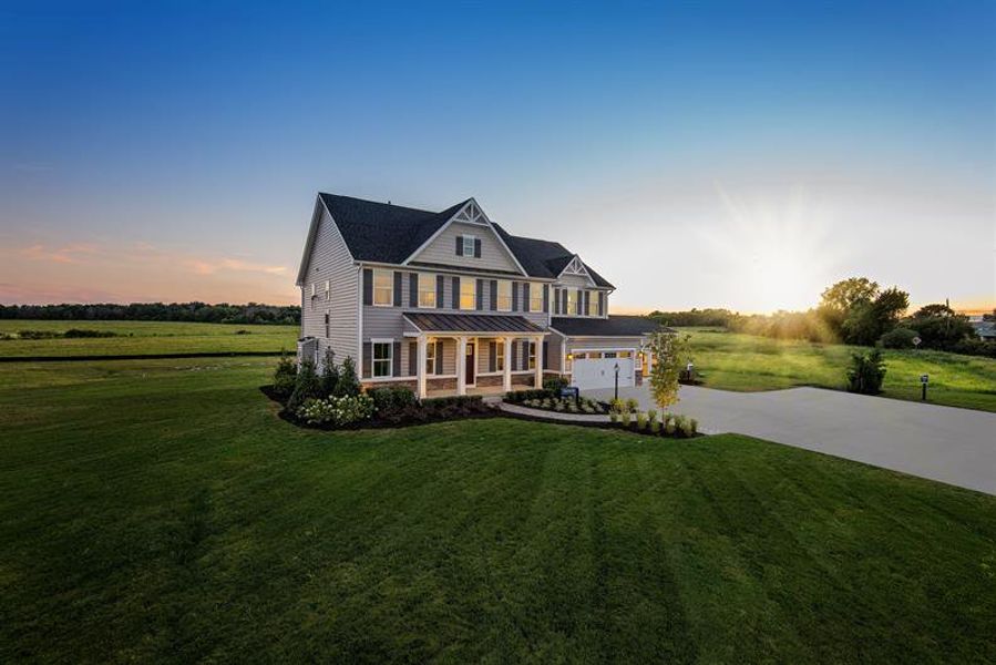 Front exterior of a home in the Backwoods Farms community, located in Moyock, NC (Image 1).