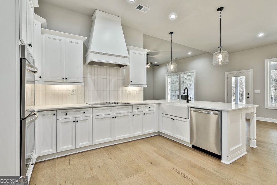 Furnished interior in a model home at Wild Fern Reserve in Newnan (Image 9).