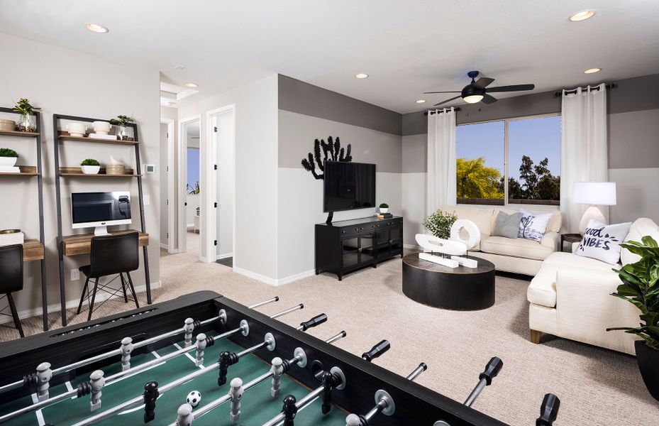Modern, second floor game room perfect for entertaining at Visara new home in Surprise, AZ