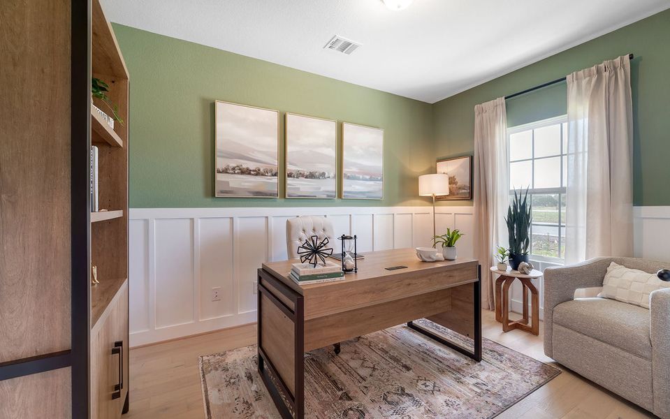 Furnished interior in a model home at Grande Estates in Bertram (Image 5).