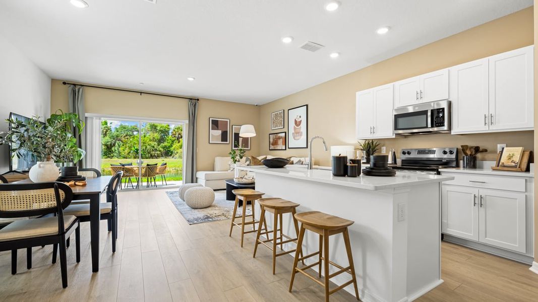 Furnished interior in a model home at The Towns at Tiburon in Nokomis (Image 43).