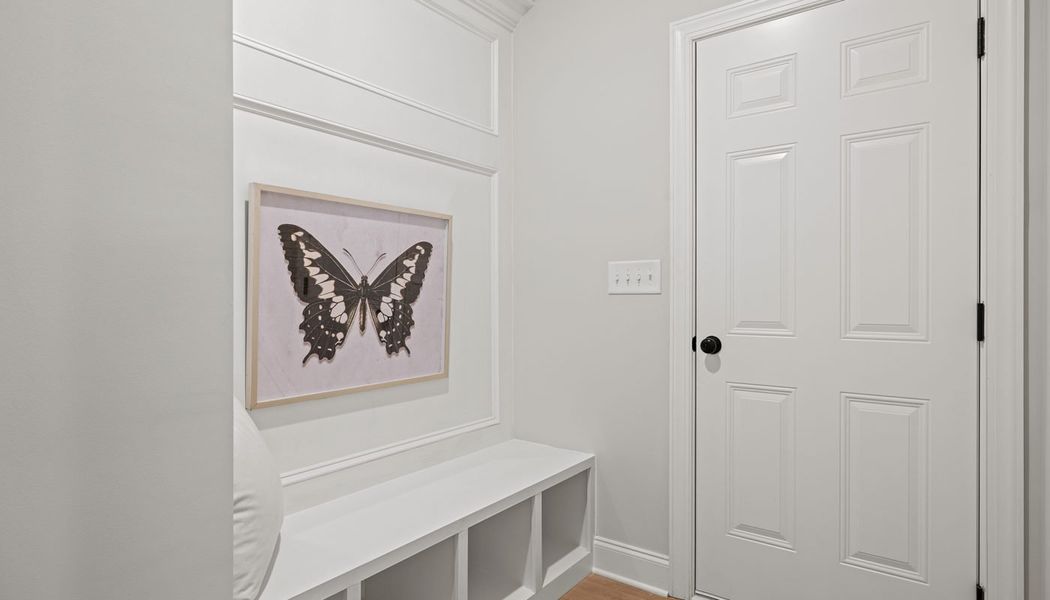 Furnished interior in a model home at Traditions of Braselton in Jefferson (Image 29).