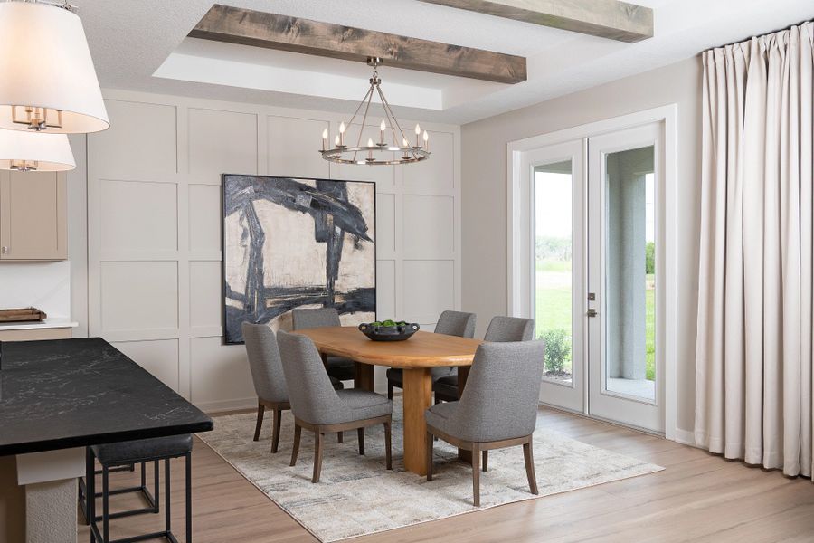 Furnished interior in a model home at Tyson Reserve in St. Cloud (Image 12).