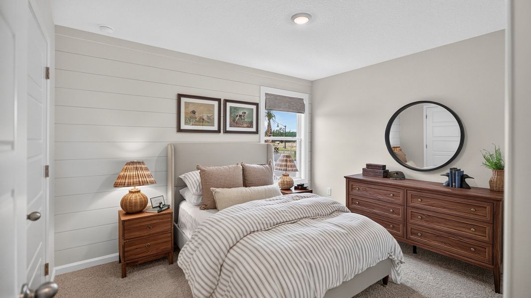 Furnished interior in a model home at Liberty Cove in Yulee (Image 15).