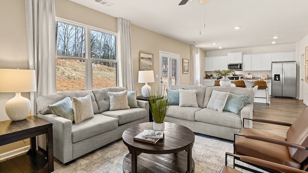 Furnished interior in a model home at Brooks Village in Dacula (Image 4).