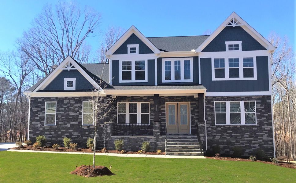 Front exterior of a home in the Sauls Landing community, located in Zebulon, NC (Image 13). Front exterior of a home in the Sauls Landing community, located in Zebulon, NC (Image 13).