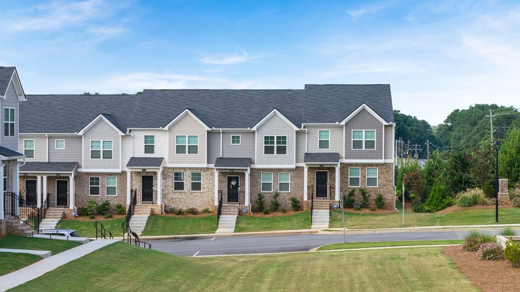 Front exterior of a home in the Inverness at Sugarloaf community, located in Lawrenceville, GA (Image 5).