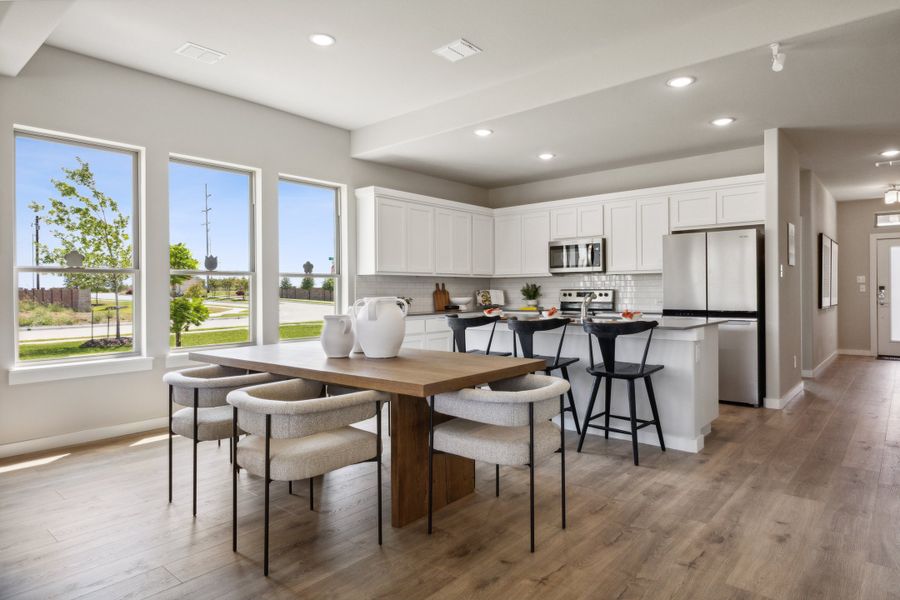 REPRESENTATIVE PHOTO – Kitchen in a Stratton Place new home in Greenville TX by Trophy Signature Homes