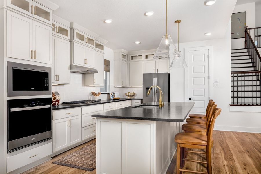Furnished interior in a model home at Parmer Ranch in Georgetown (Image 31).