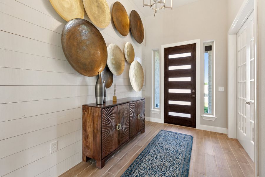 Furnished interior in a model home at Persimmon in Buda (Image 4).