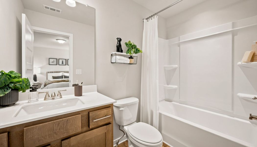 Furnished interior in a model home at Fowler Farms in Auburn (Image 52).