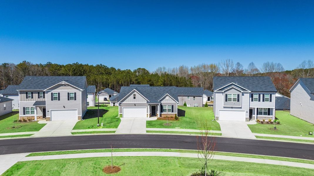 Front exterior of a home in the Champion's Run community, located in Lithonia, GA (Image 12).