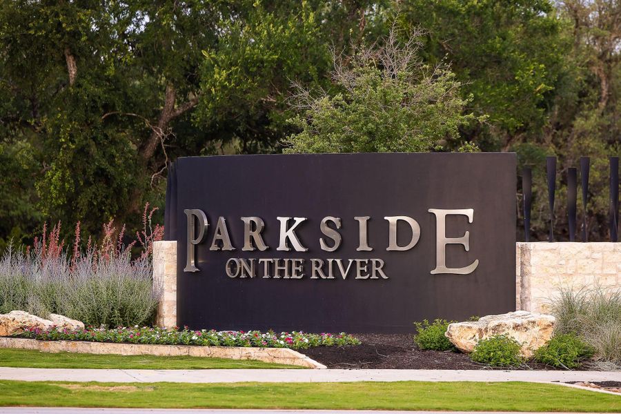 Entrance to the Parkside On The River community in Georgetown, TX, featuring signage and landscaping (Image 10).