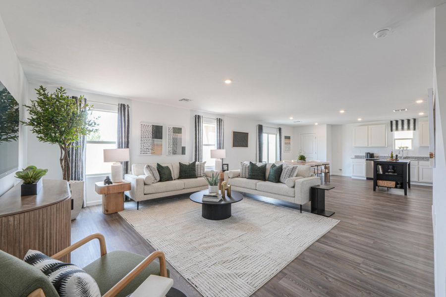 A living room with a fireplace. A living room with a fireplace.