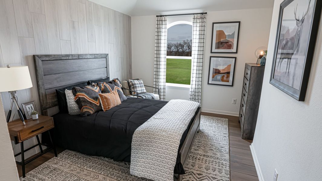 Furnished interior in a model home at High Country in Burleson (Image 7).