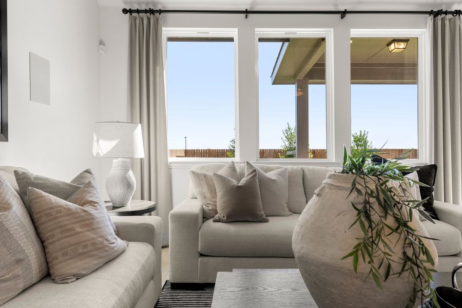 Furnished interior in a model home at South Meadow in Melissa (Image 22).