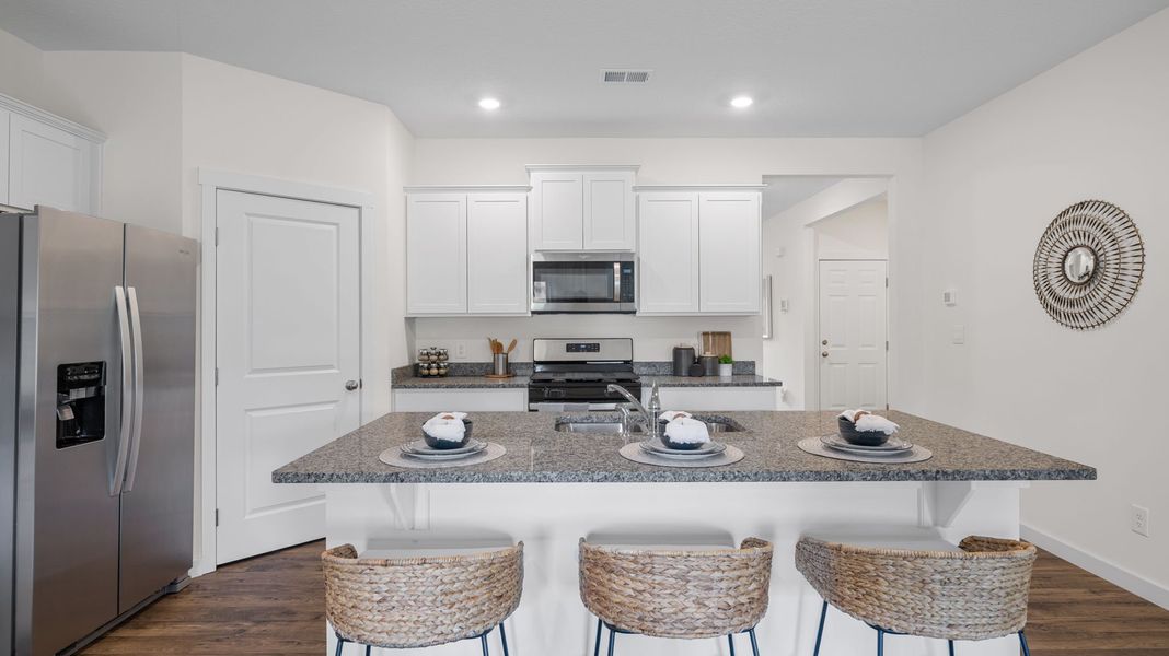 Furnished interior in a model home at Hillcrest Landing in McDonald (Image 15).