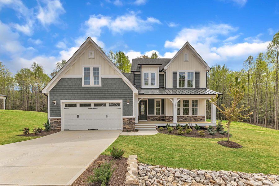 Front exterior of a home in the WyndWater community, located in Hampstead, NC (Image 28).