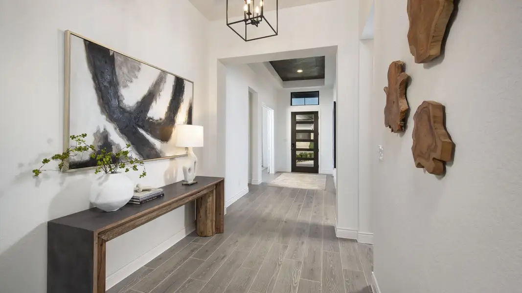 Furnished interior in a model home at Kinder Ranch 70' in San Antonio (Image 4).