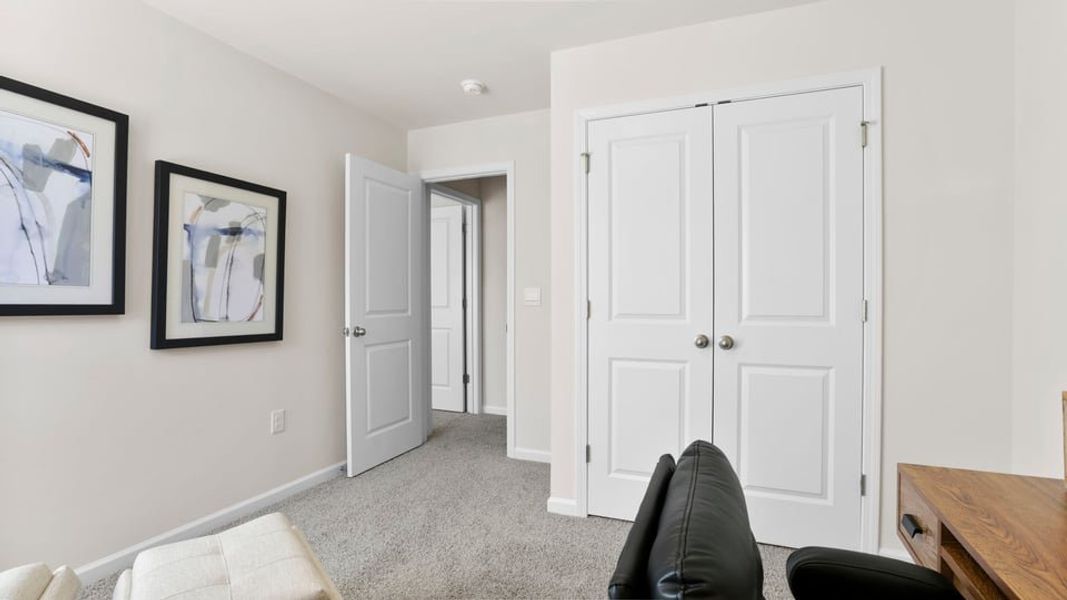 Furnished interior in a model home at Village Grove in Greenville (Image 23).