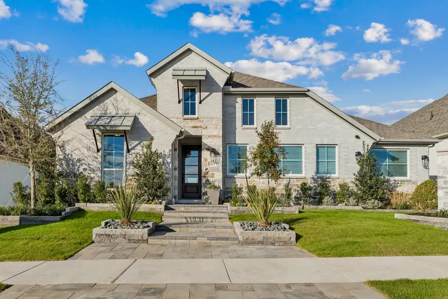 Street view of homes within the Meraki master-planned community in Forney, TX (Image 3).