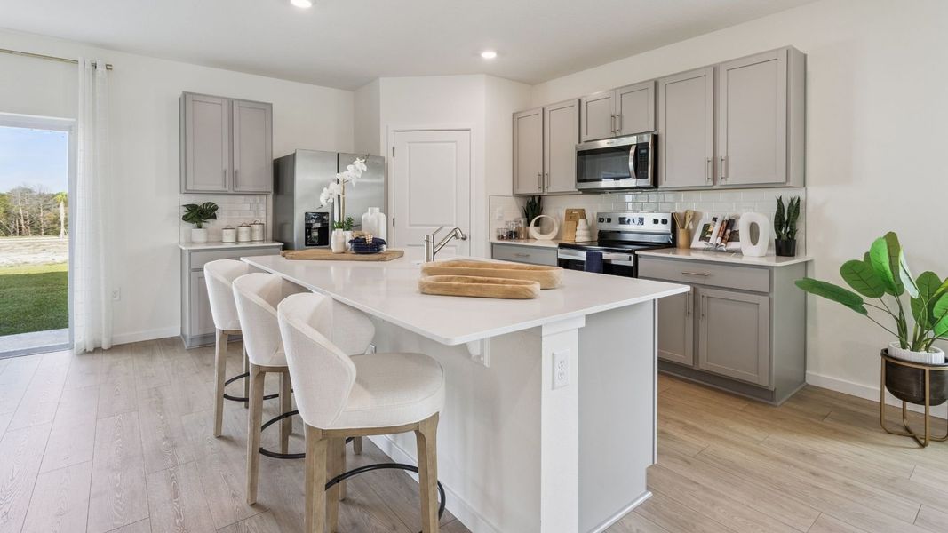 Furnished interior in a model home at Crossroads at Kelly Park in Apopka (Image 13). Furnished interior in a model home at Crossroads at Kelly Park in Apopka (Image 13).
