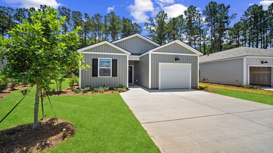 Front exterior of a home in the The Retreat at East Argent community, located in Ridgeland, SC (Image 20).