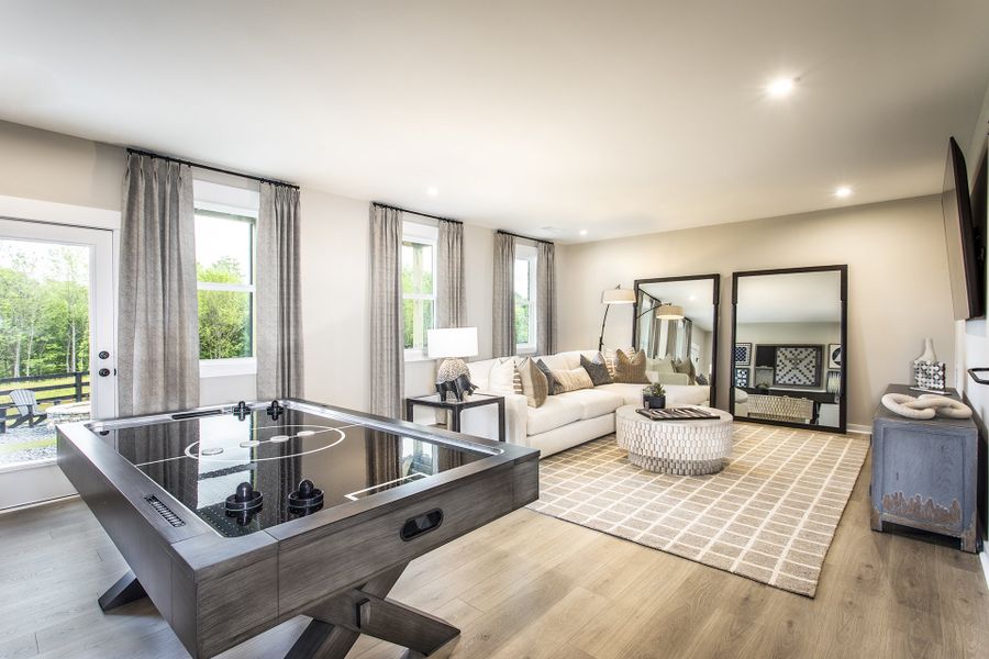 Furnished interior in a model home at Hopewell Reserve: Hopewell - 40' Value in Cumming (Image 12).