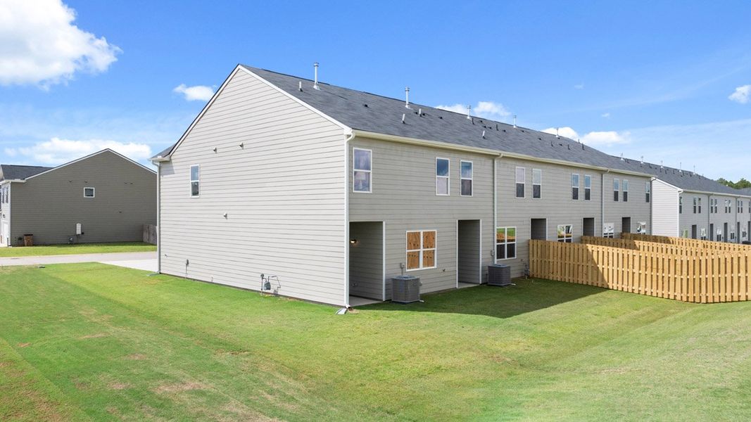 Front exterior of a home in the The Abbey at Trolley Run Station community, located in Aiken, SC (Image 10).