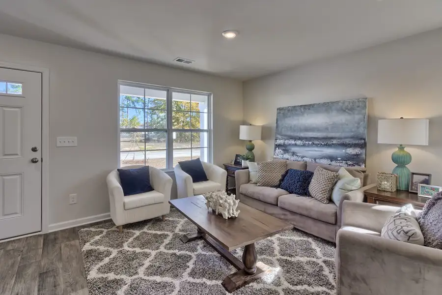 Furnished interior in a model home at Blackwood Street in Greenville (Image 5). Furnished interior in a model home at Blackwood Street in Greenville (Image 5).