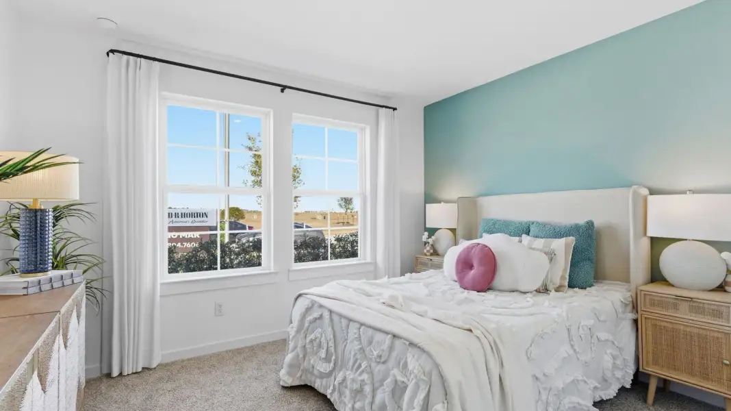Furnished interior in a model home at Lago Mar 60' Homesites in Texas City (Image 29).