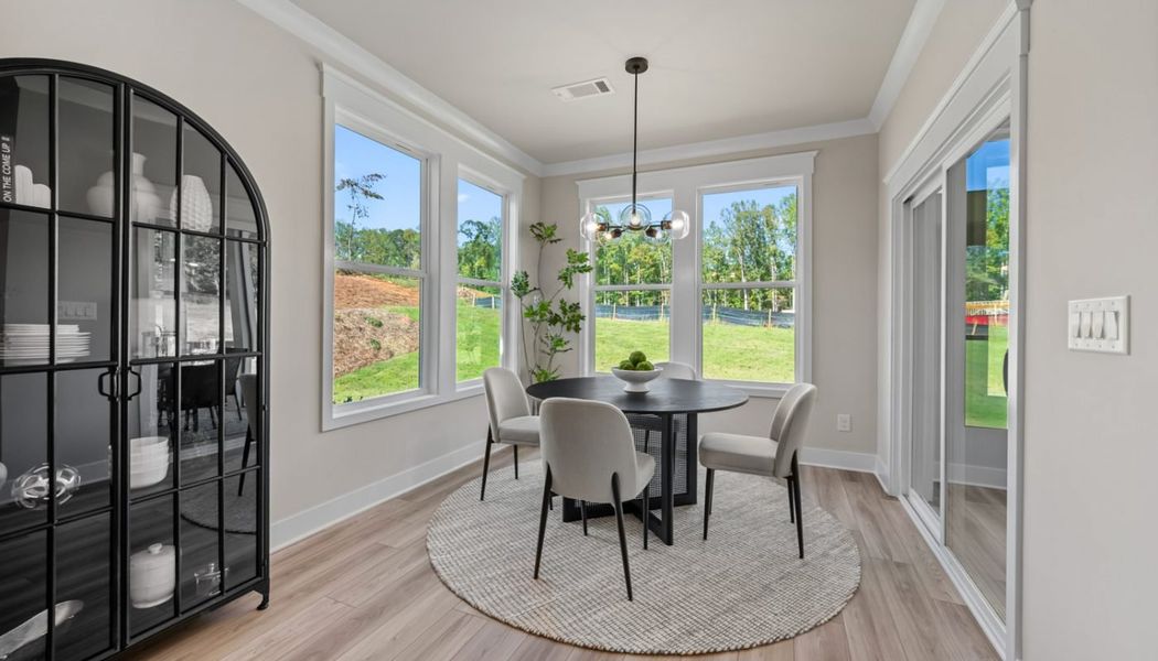 Furnished interior in a model home at Rosewood Lake Preserve in Hoschton (Image 22).