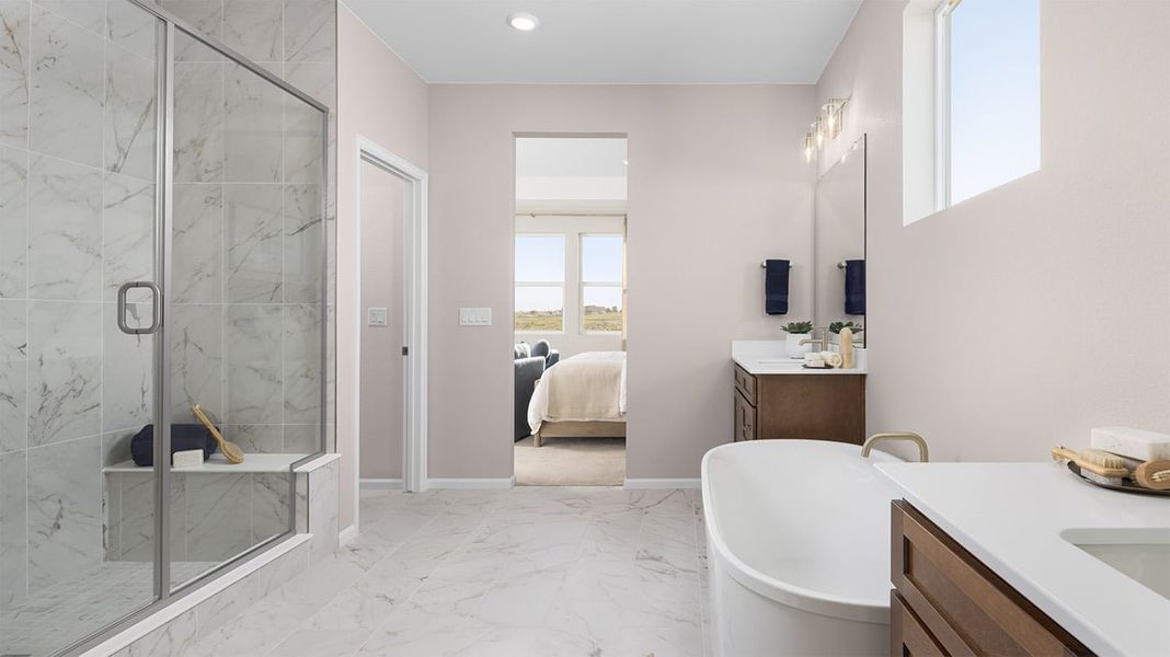 Furnished interior in a model home at The Estates Collection at Talon Pointe in Thornton (Image 28).