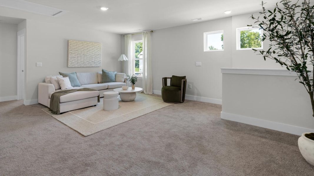 Furnished interior in a model home at Surfside Landing in Hubert (Image 19).