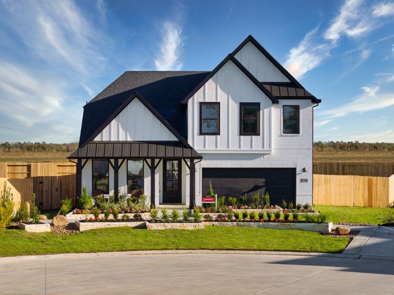 Front exterior of a home in the Ellwood: Heritage Collection community, located in Iowa Colony, TX (Image 4).