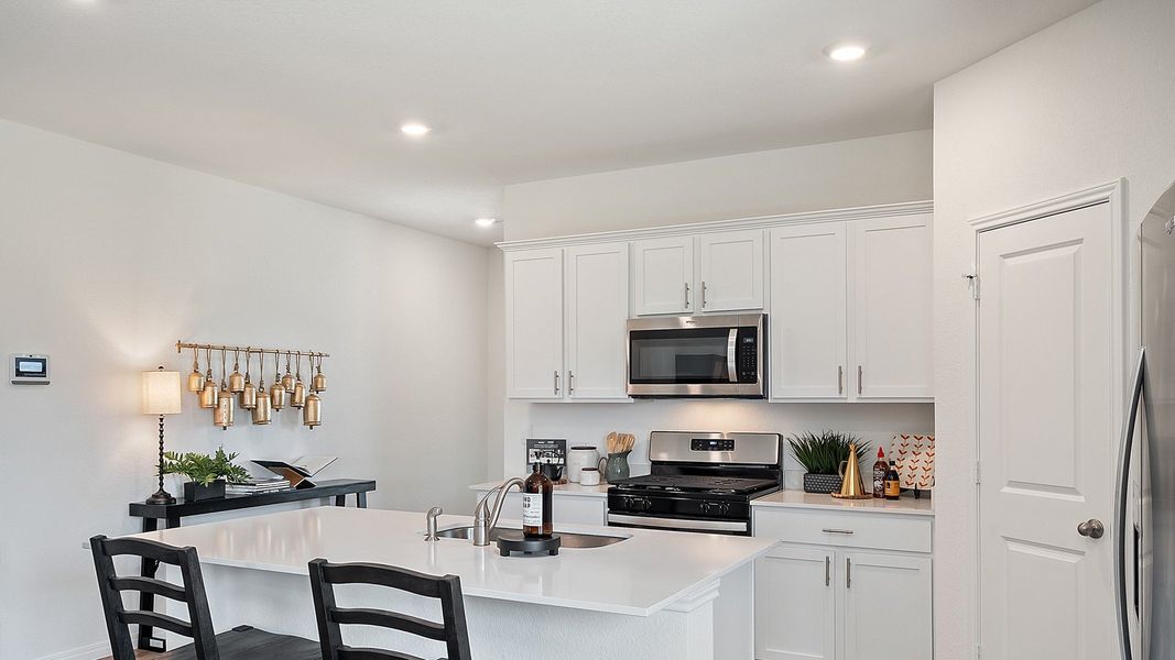 Furnished interior in a model home at Rosenbusch Ranch in Leander (Image 59).