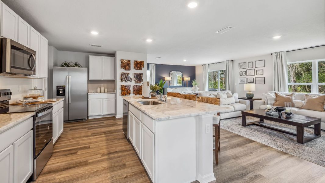 Furnished interior in a model home at Bella Lago in Parrish (Image 6).