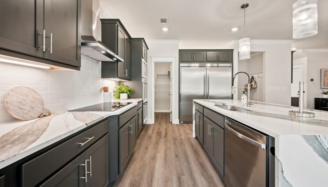 Furnished interior in a model home at Fowler Farms in Auburn (Image 120).