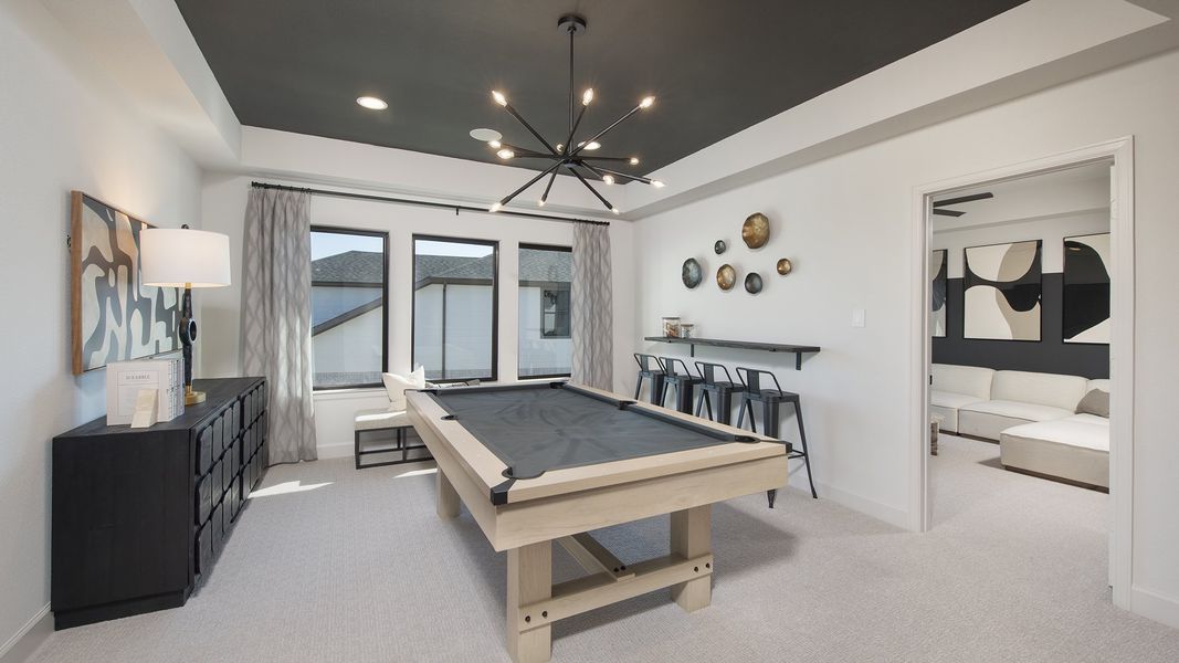 Furnished interior in a model home at Cross Creek West 55' in Fulshear (Image 19).