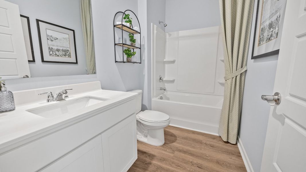 Furnished interior in a model home at Cottages at Blue Ridge in Bonaire (Image 17).