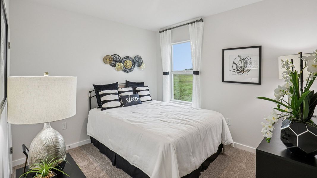 Furnished interior in a model home at Seagrass in Punta Gorda (Image 27).