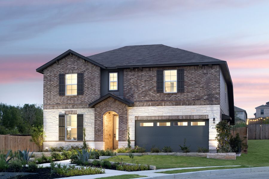 Front exterior of a home in the Comanche Ridge community, located in San Antonio, TX (Image 9).